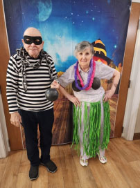 memory care residents in Halloween costumes