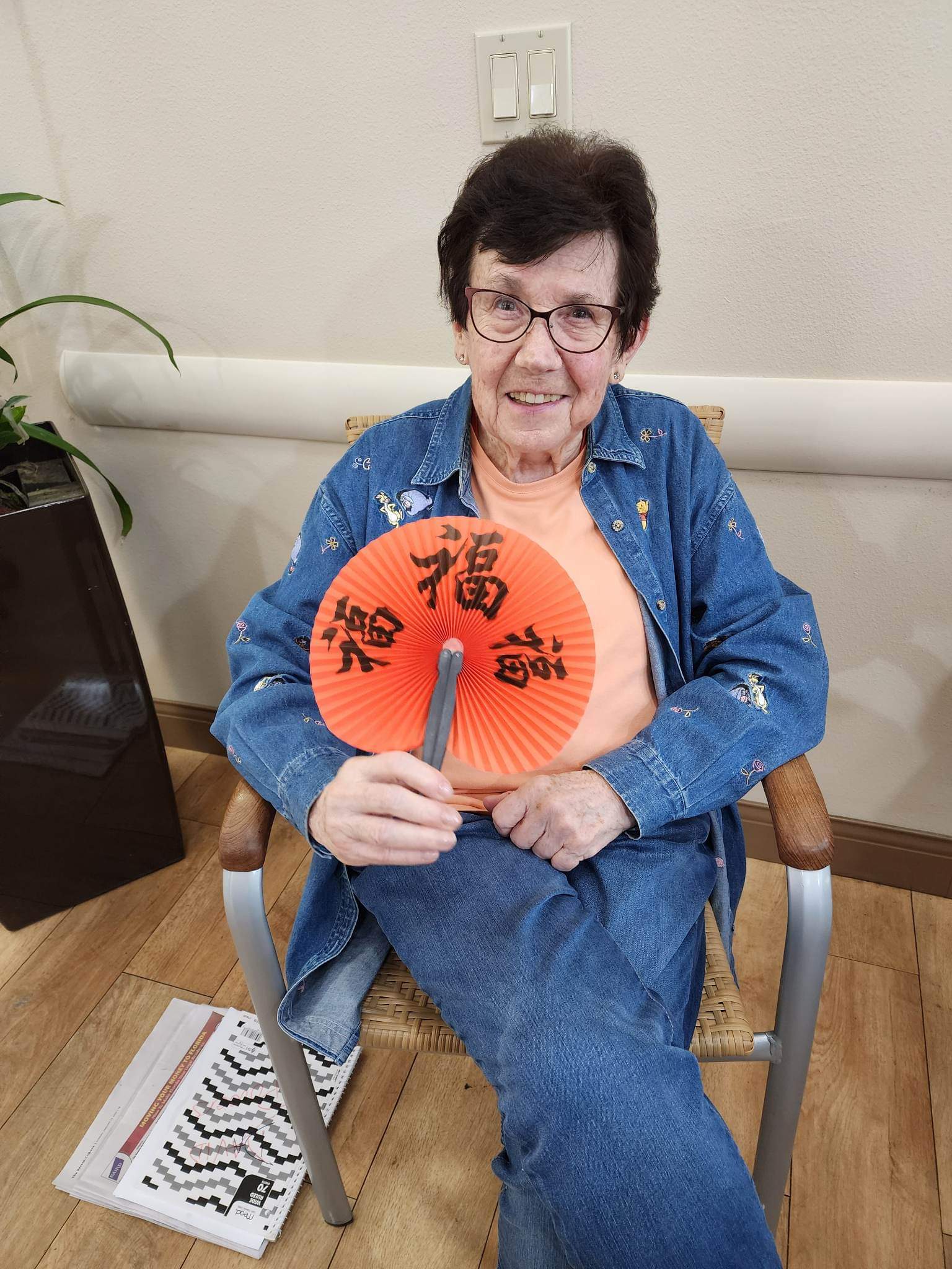 Aravilla Memory Care senior resident smiling celebrating